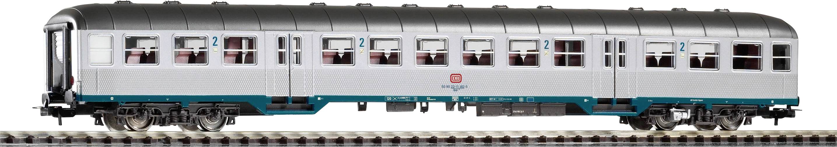 Model railway passenger carriage in silver-blue on tracks, marked with 'DB'. Simple design with multiple windows.