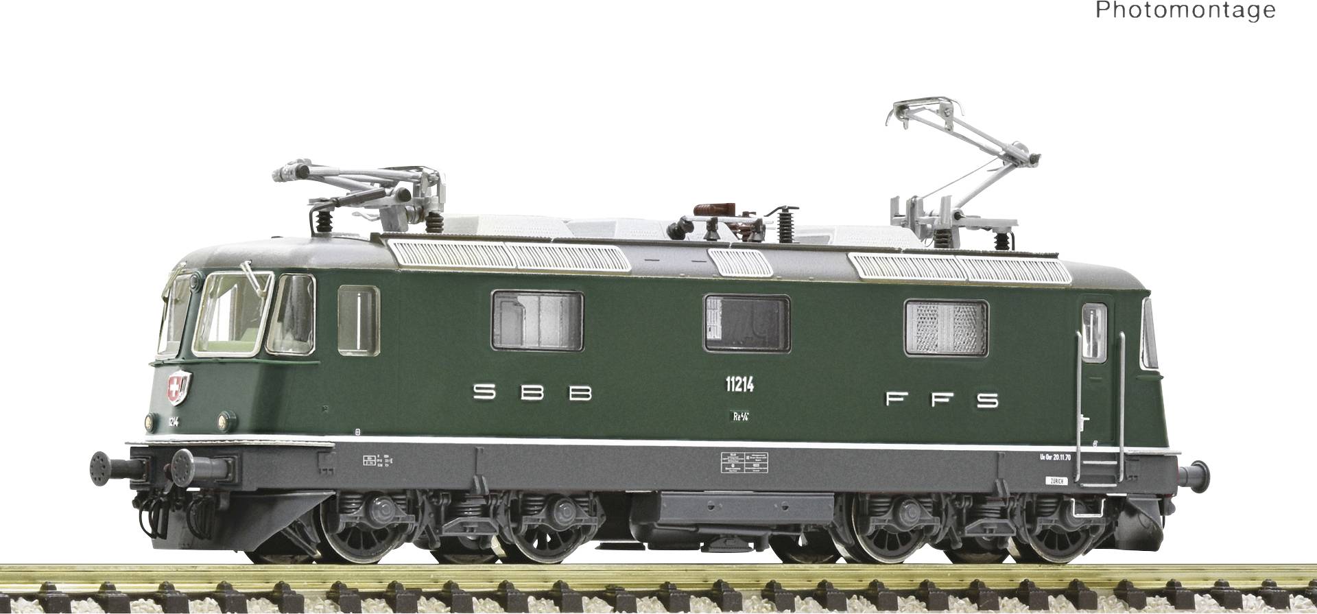 The image shows a green model of an SBB FFS electric locomotive on a track, photographed from the side. 'Photomontage' is written in the top right corner.