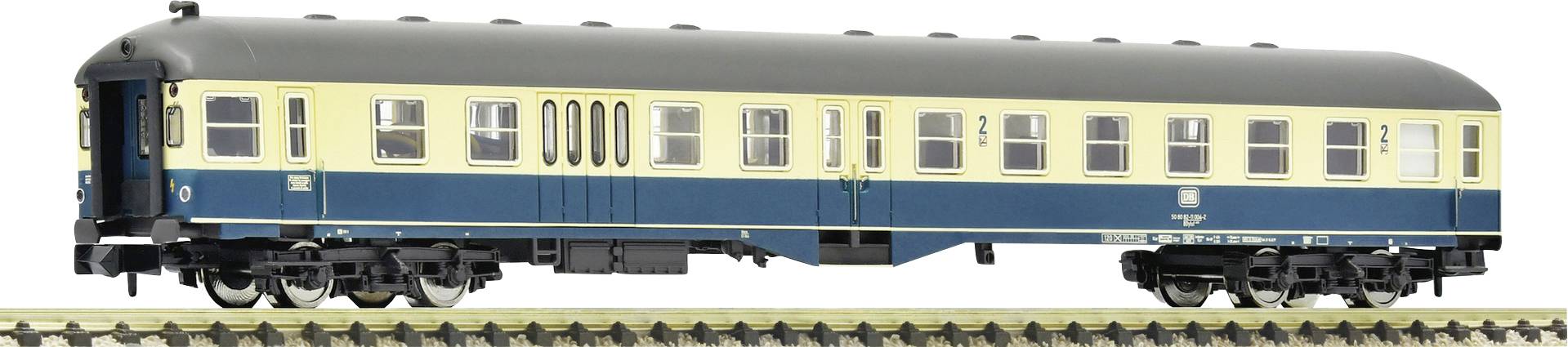 A model of a blue and beige passenger train carriage on a railway track, depicted in detail with windows and doors.