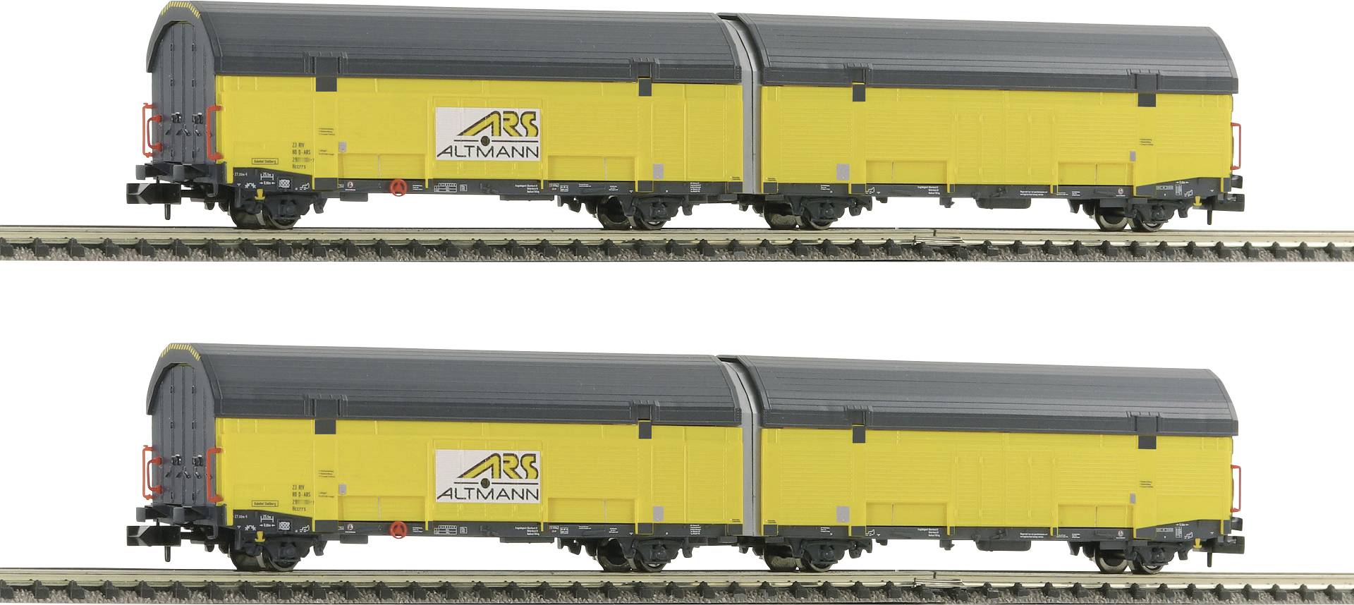 Two model trains in yellow paintwork with 'ARS Altmann' logo on the sides, positioned on a track and shown from a side view.