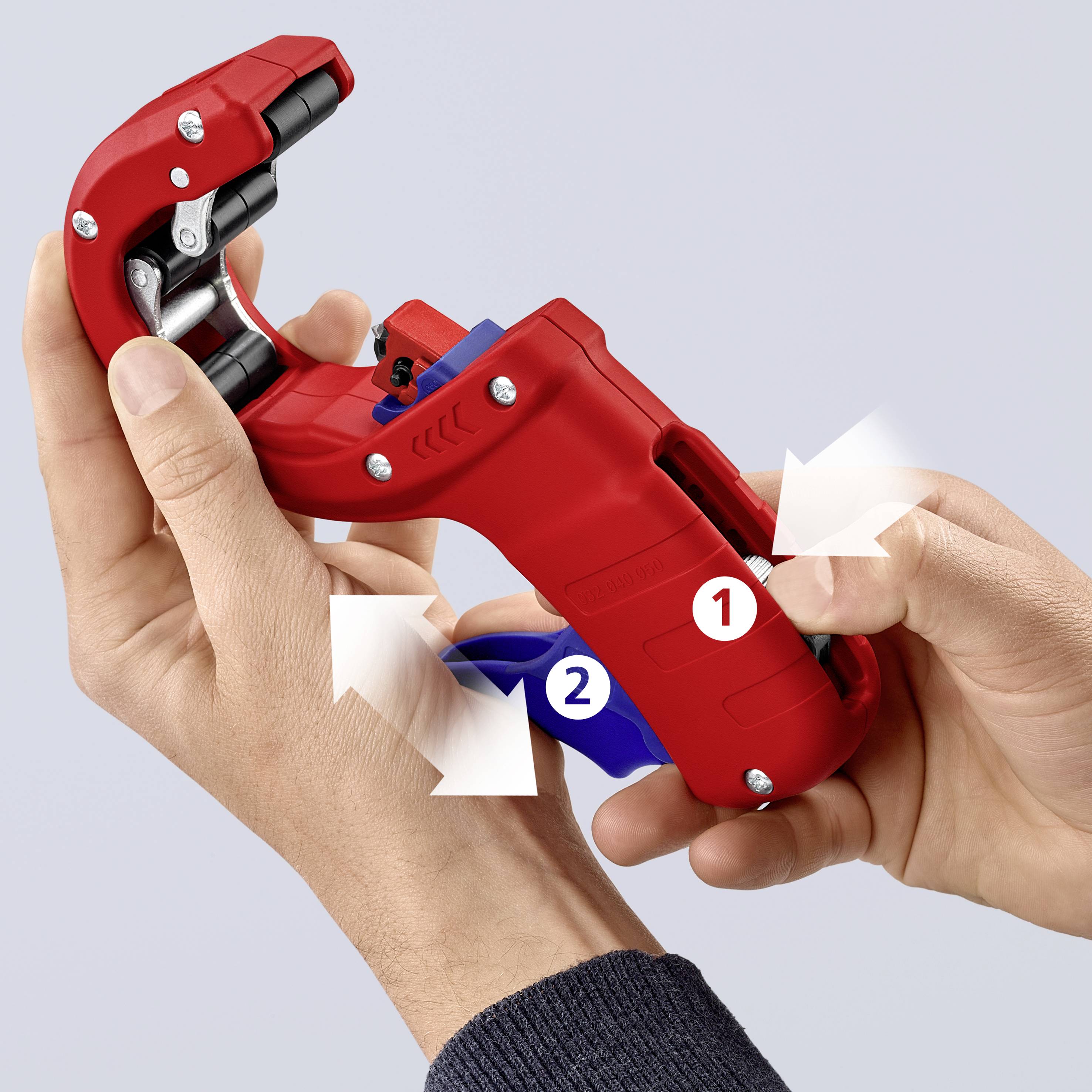 Two hands are operating a red tool with a numeric keypad. Arrows point to various parts of the tool.