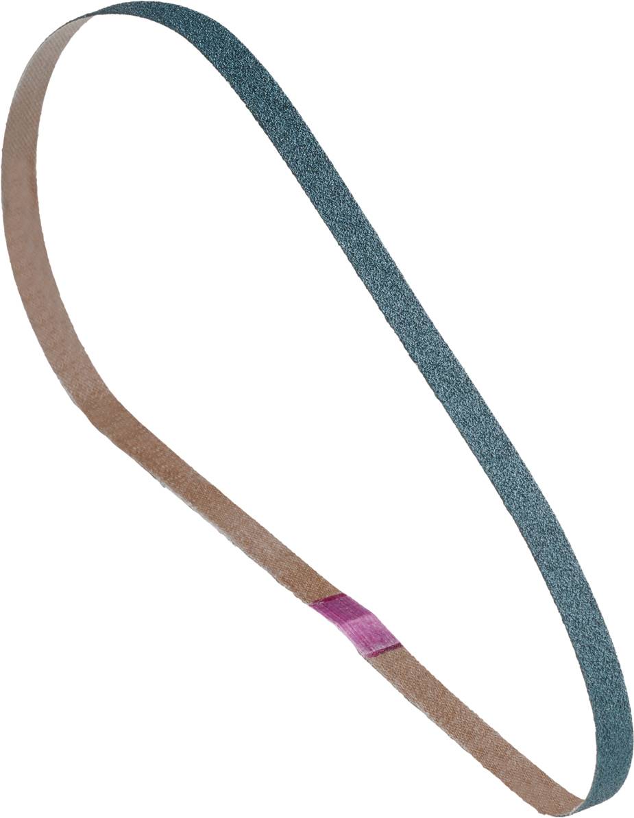 A closed loop belt with both a brown and green surface lies diagonally and shows its texture.