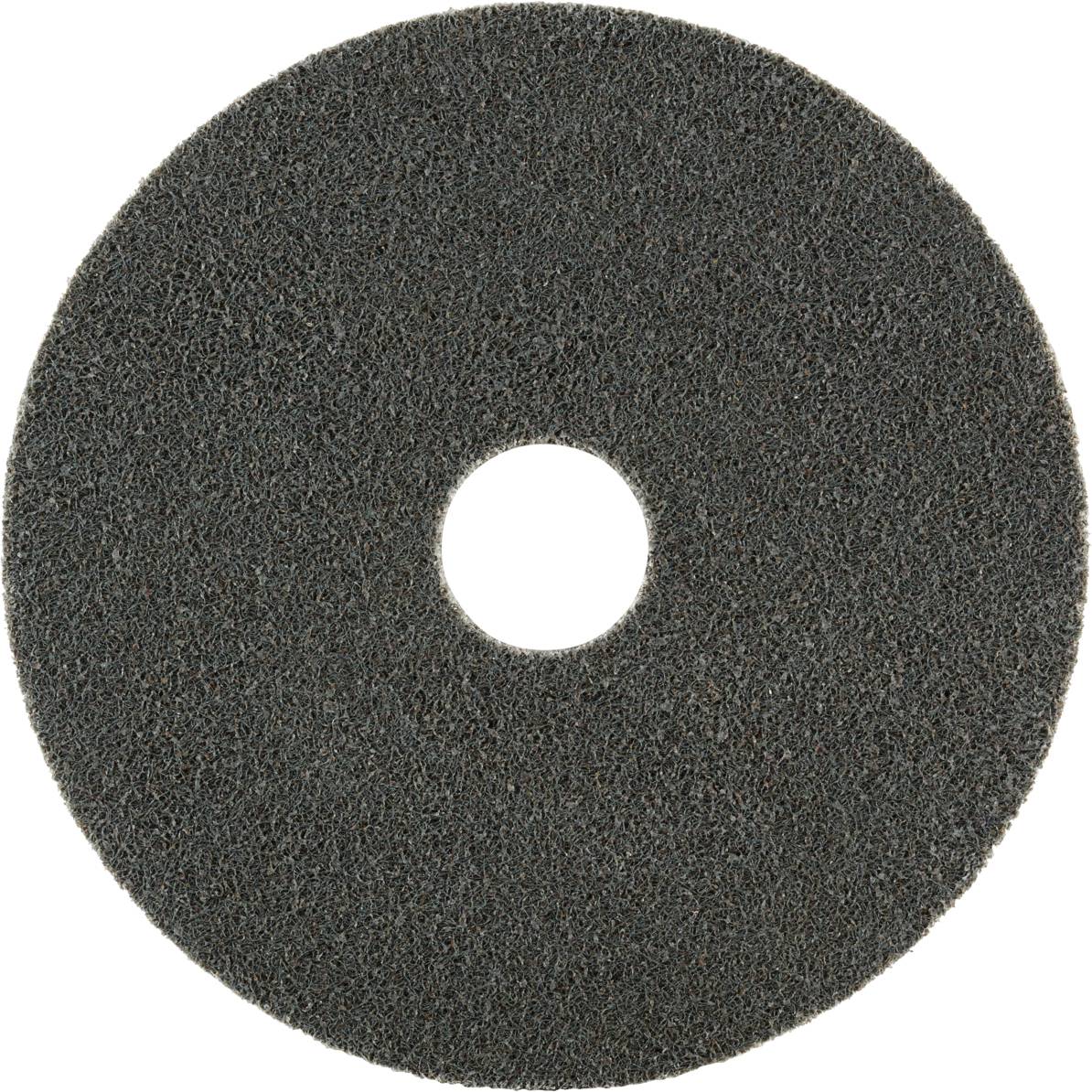 Black grinding disc with central hole, for polishing surfaces.