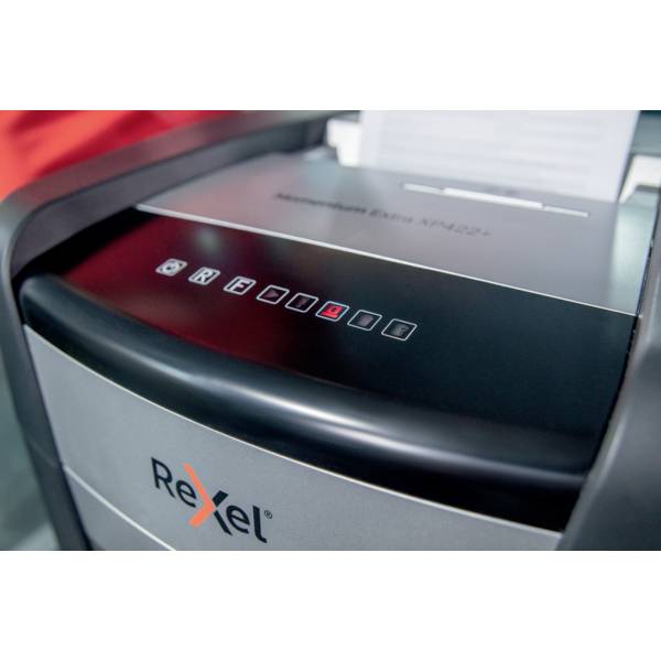 A paper-filled shredder by the brand 