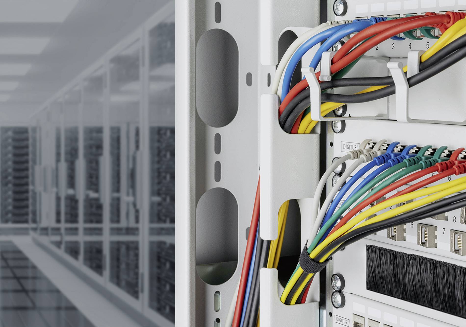 Network centre with colourful cables connected to a server. Shelves with additional servers in the background.