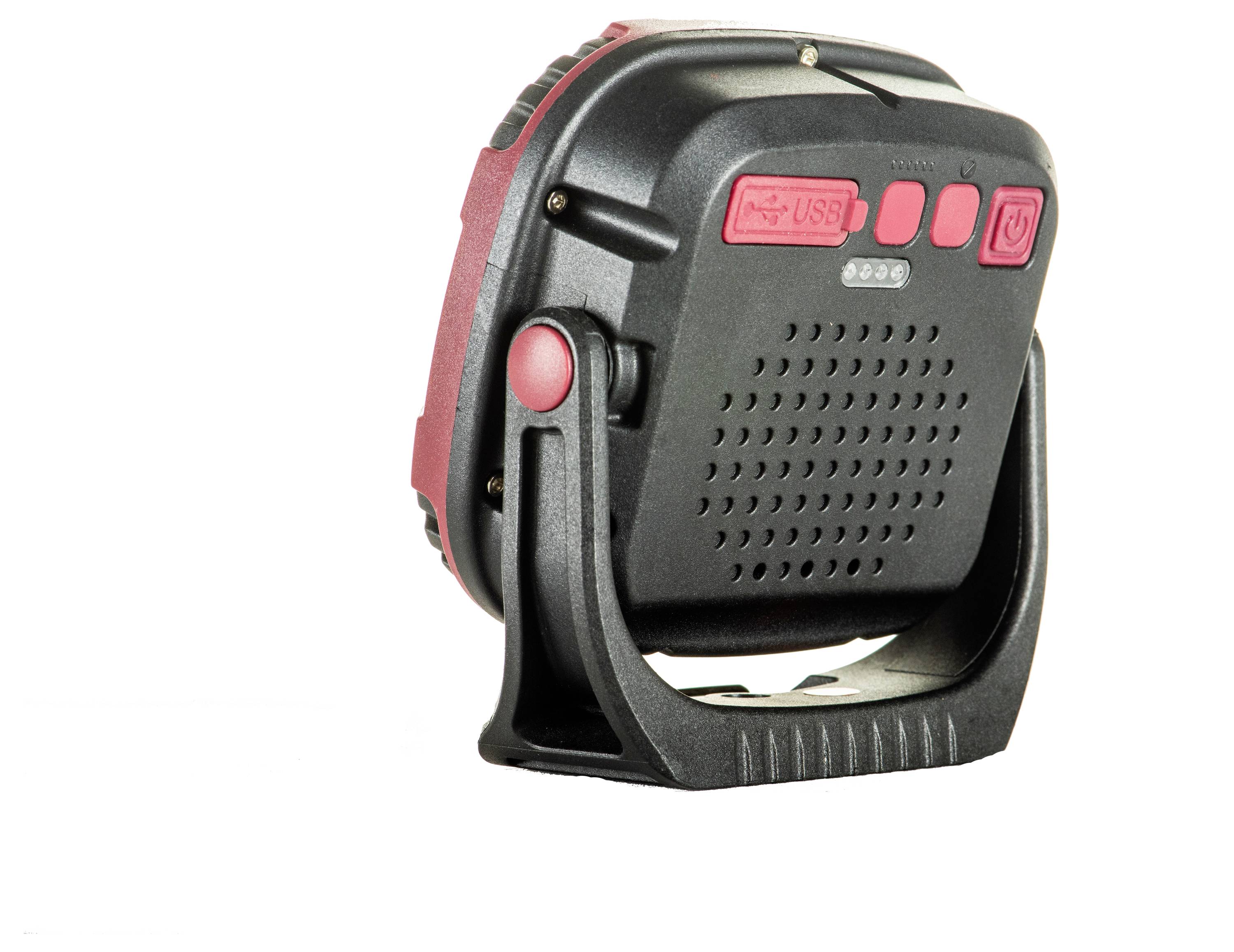 A red, portable speaker system with a USB port, control buttons and a sturdy, black carrying handle.