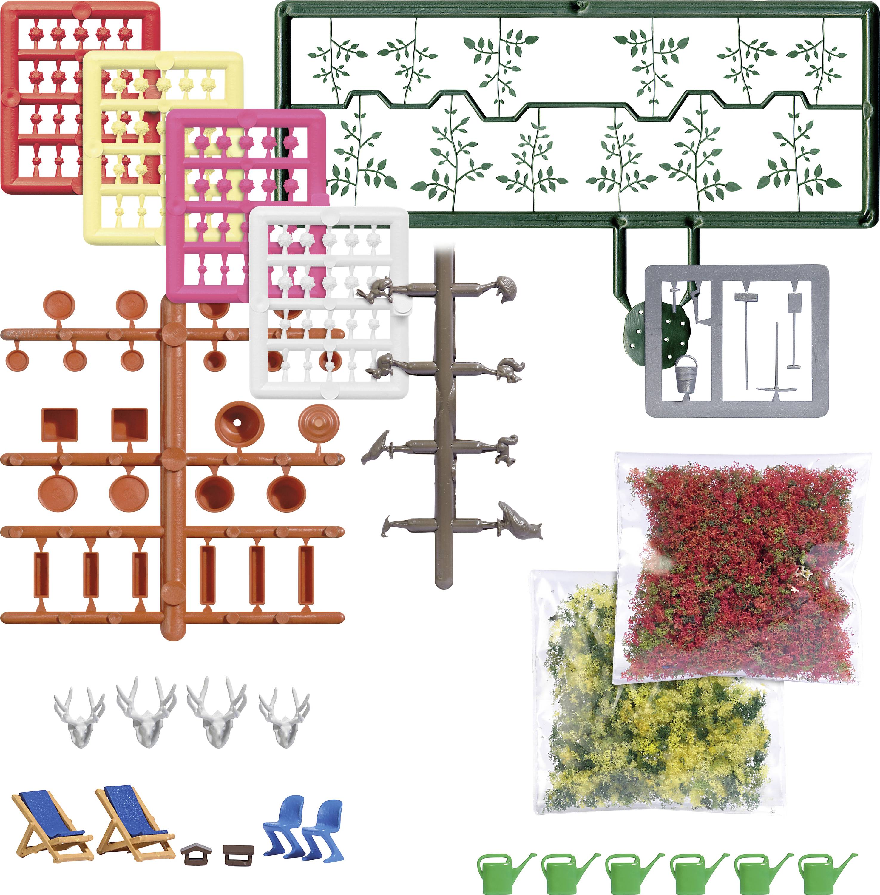 Various model kits with plant motifs, furniture, and decorations in different colours and shapes for creative craft projects.