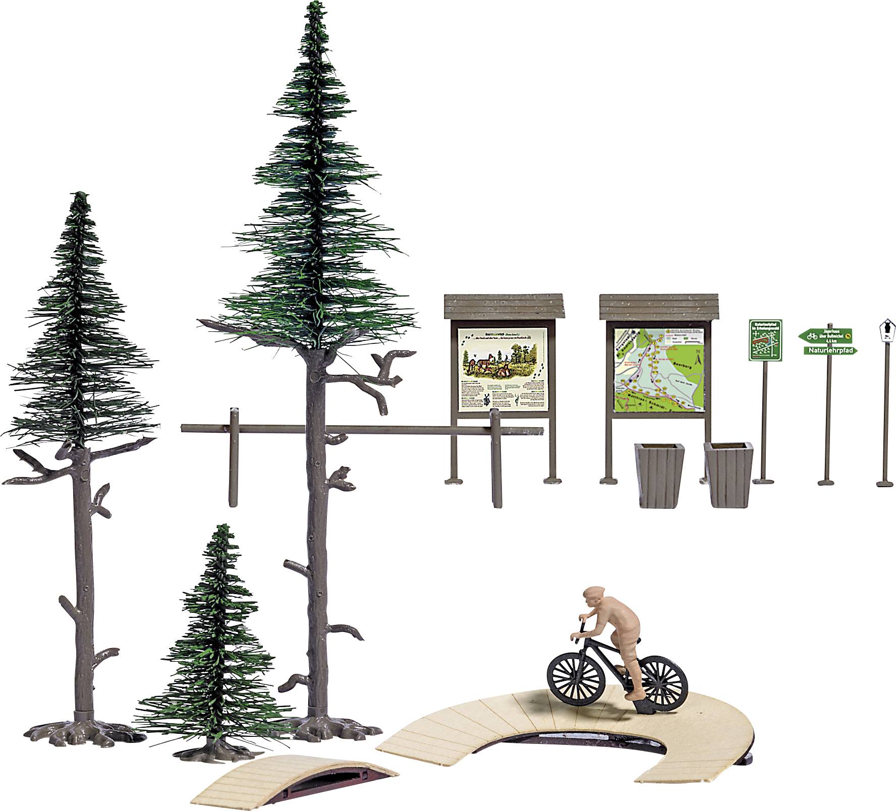 A miniature model featuring trees, signposts, and a figure on a bicycle crossing a wooden bridge.