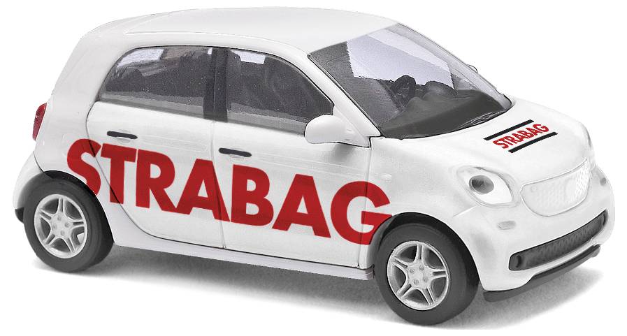A white toy car with the red STRABAG logo on the side and bonnet. The car is a model of a modern compact car.