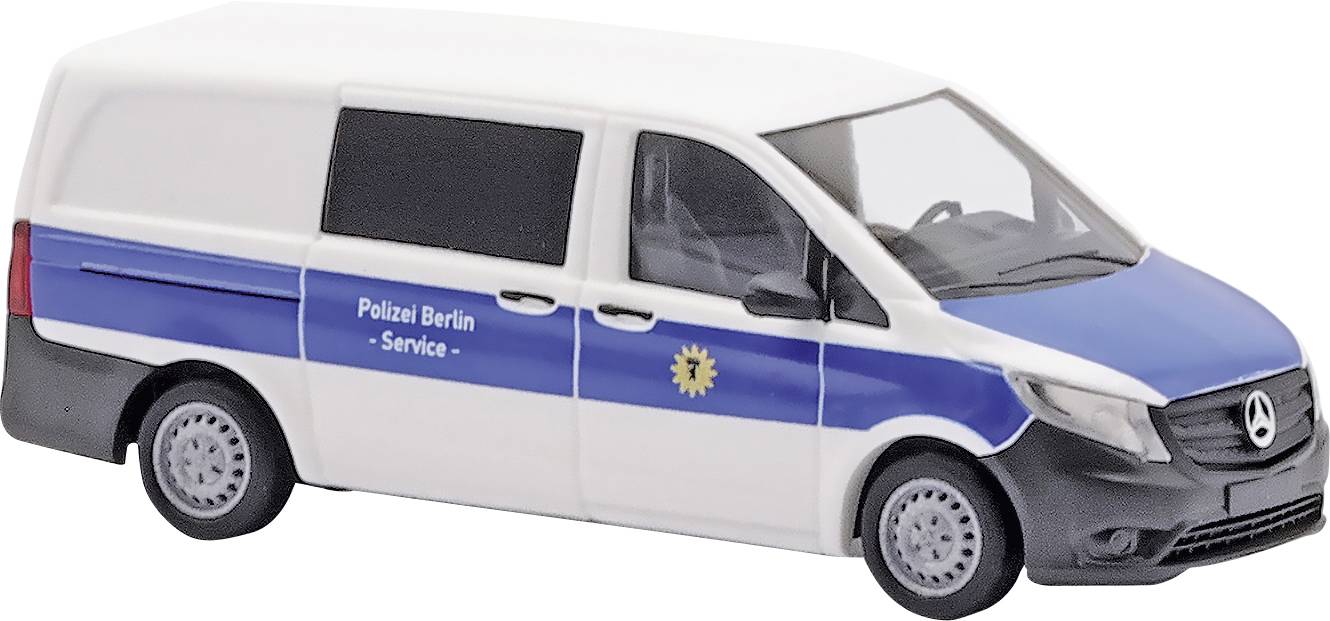 A white van with a blue side stripe and police emblem, marked with 'Police Berlin - Service'.