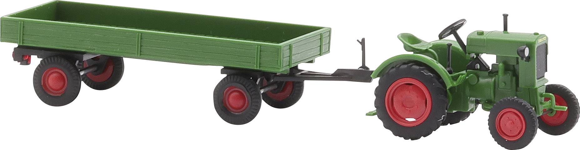 Toy tractor with green trailer on red wheels.