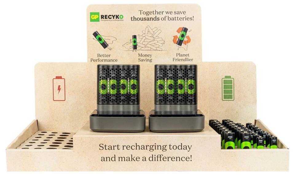 A sales display shows rechargeable batteries in two chargers. Text at the top: 'Together we save thousands of batteries'.