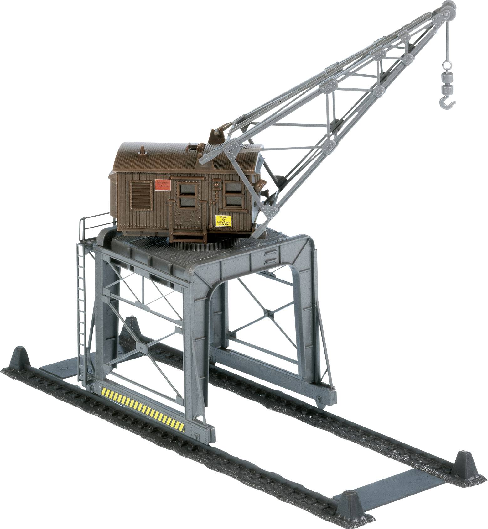 Model of a crane on rails with a brown cabin and silver arm. Suitable for model building or toy landscapes.