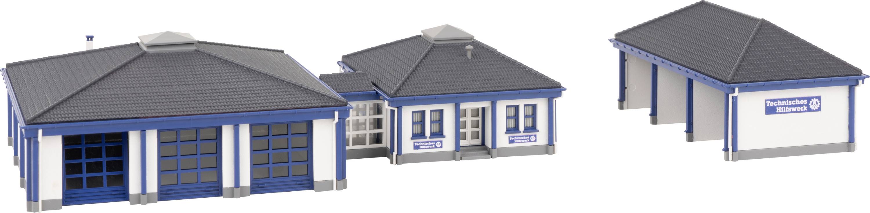Three scale models of THW buildings in blue and white colours. One has a garage door, the others are office buildings.