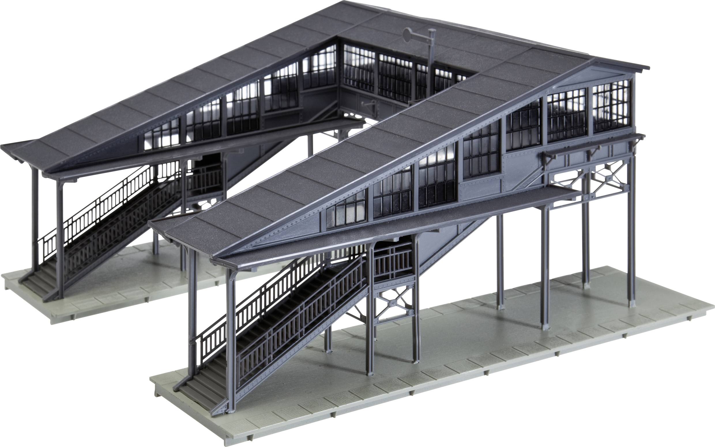 Double-deck platform footbridge in model scale with staircase entrances and covered construction. Modern architectural style.