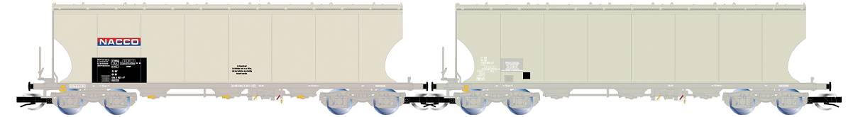 Two beige freight wagons by 'Nacco' with blue and red lettering, stationary view, unconnected in an industrial setting.