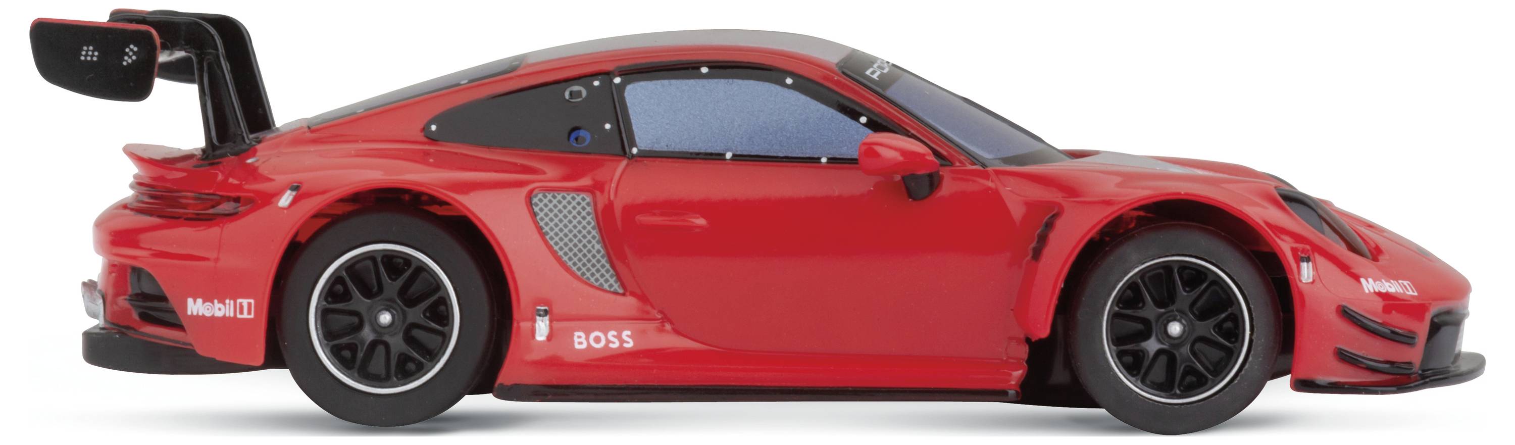 A red toy car in side view. The model has a large rear spoiler and black rims. It is designed in a sporty style.