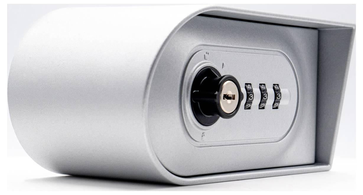 Grey, closed numerical lock case with combination dials and keyhole, for securely storing small items.