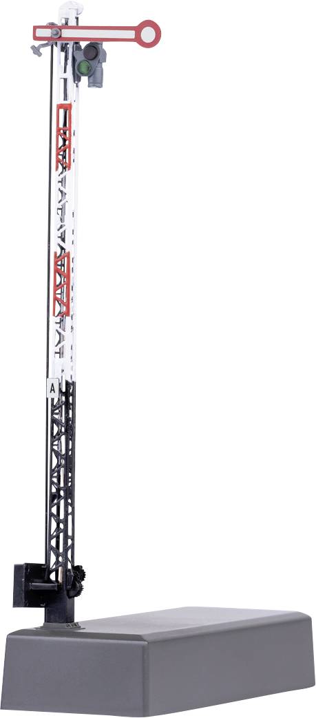 Toy railway signal on a grey base with a red lever on top, indicating a stop signal. Model made of plastic and metal parts.