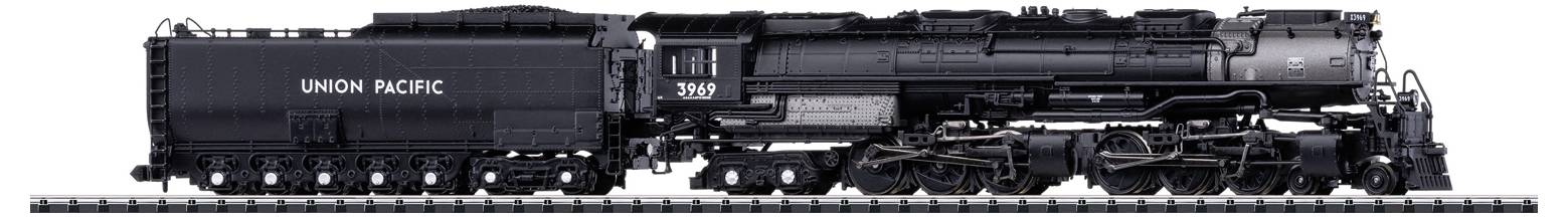 A black steam locomotive from Union Pacific, shown from the side view. It has several large wheels and complex mechanical components.
