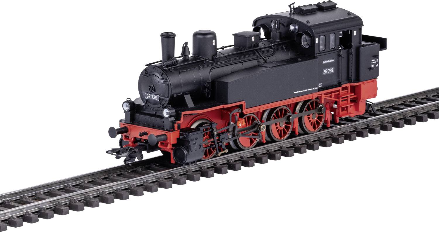 Black steam locomotive with red wheels on a railway track. Model at scale with detailed features and markings visible.