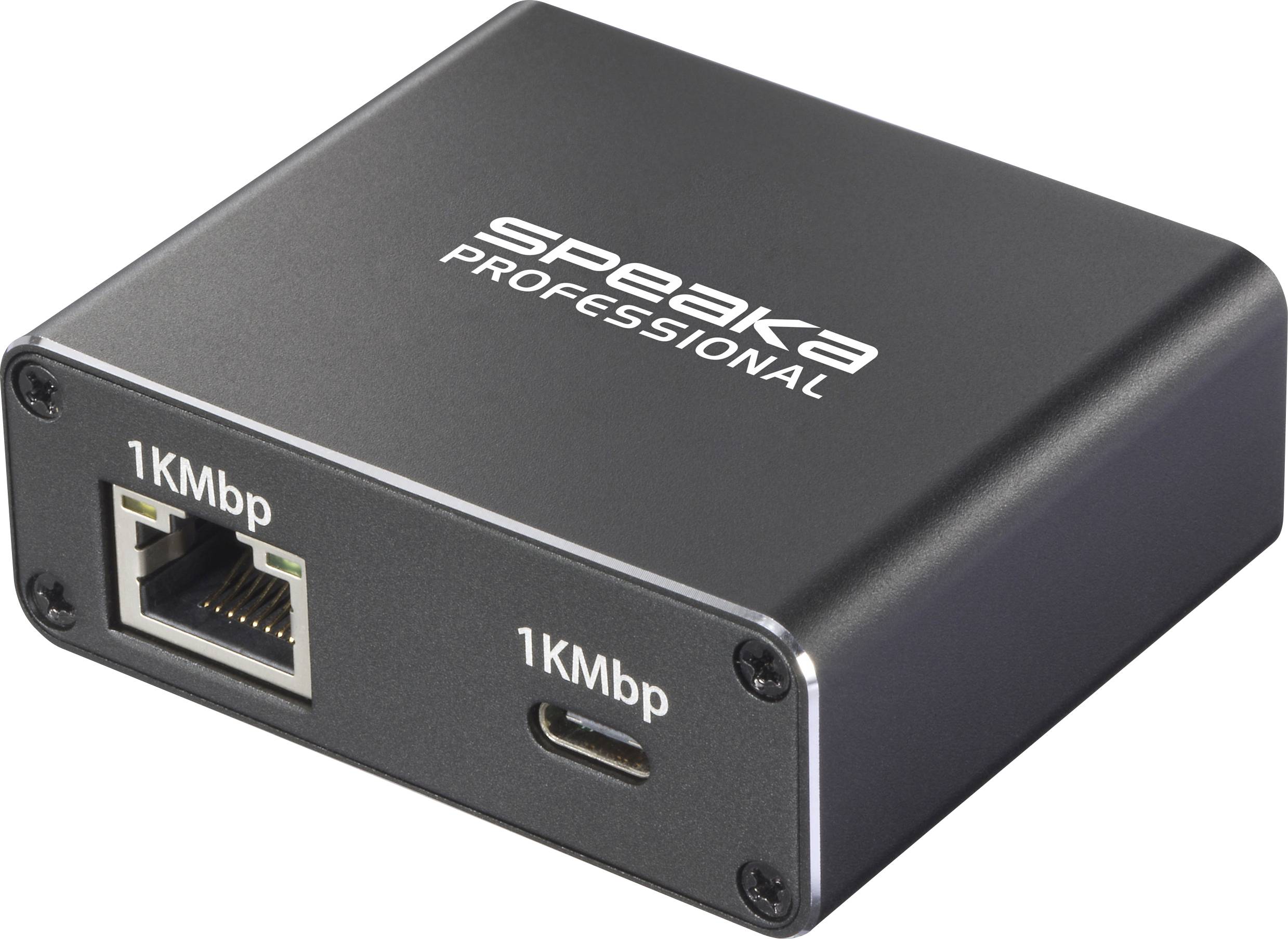 'Speaka Professional' network adapter with an Ethernet and USB port labeled '1KMbp'.