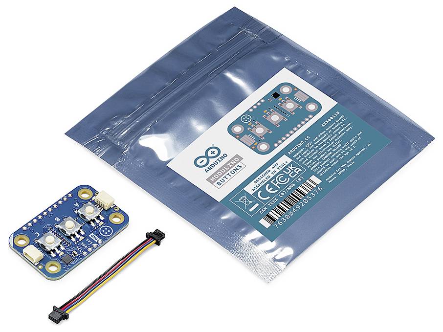 Arduino sensor board with four LEDs and included cables. Packaging with 'Arduino Module' inscription in the background.