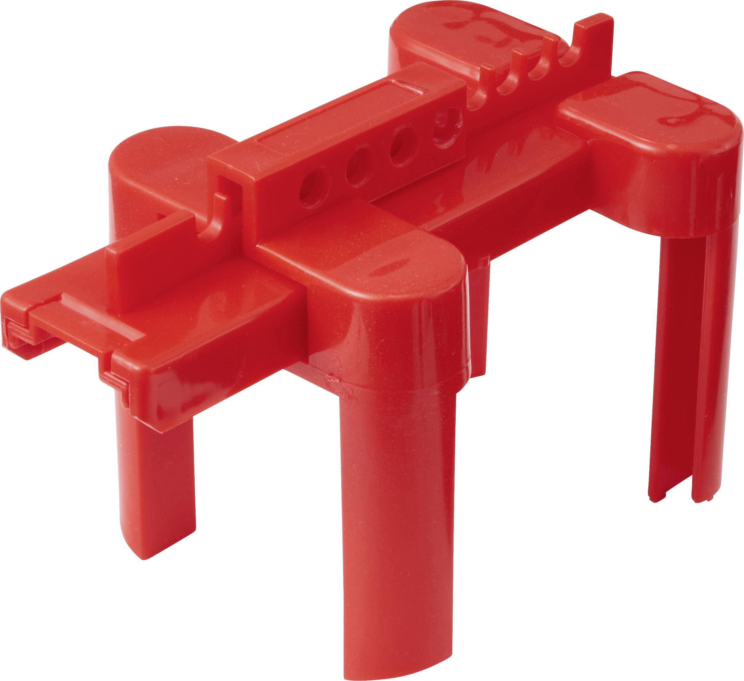 A red plastic construction block shaped like a small animal with four legs and a flat top.