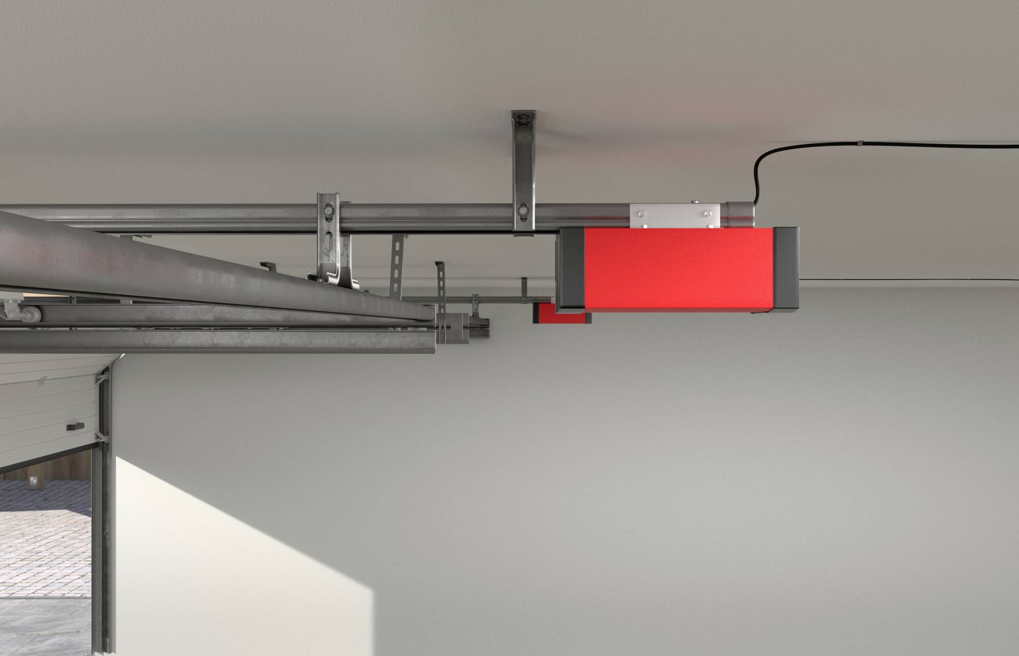 Ceiling-mounted red garage door opener with a connected rail system. The garage door is partially open, revealing sunlight outside.