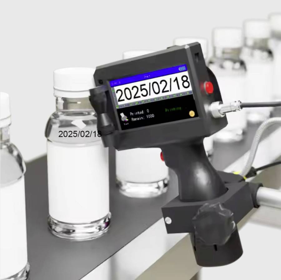 A dated inkjet printer prints '2025/02/18' on white bottles moving along a conveyor belt, indicating product labeling in a factory setting.