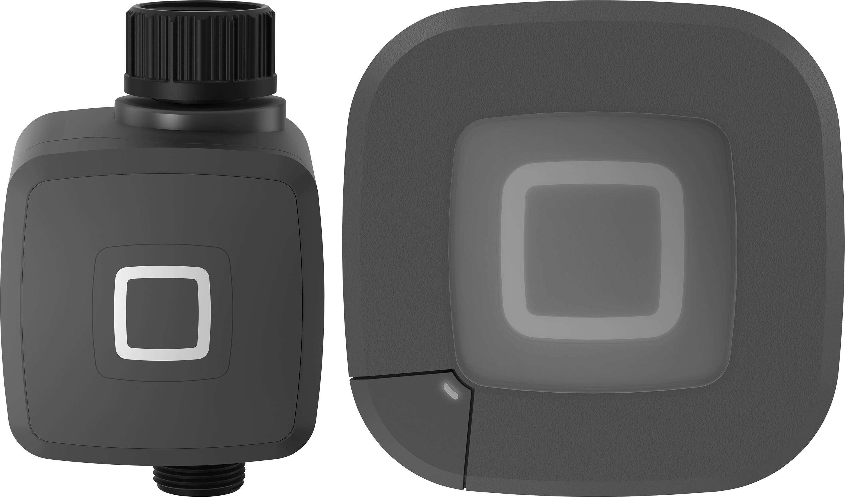 A dark square-shaped device with a round dial on top and a central square pattern on the front, viewed from a side and front angle.