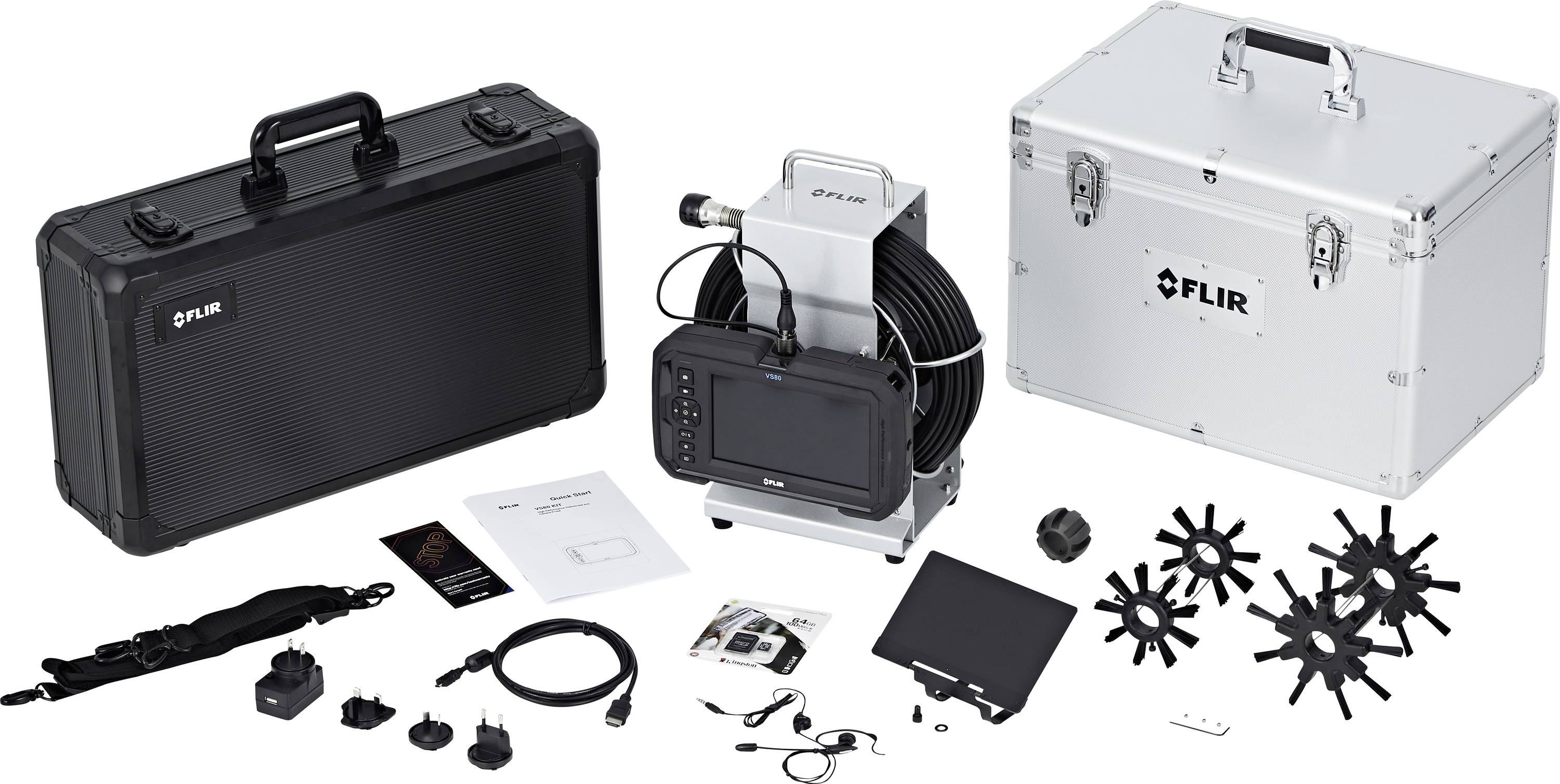FLIR thermal imaging equipment set, including a portable case, various cables, adaptors, and instruction manuals laid out on a surface.