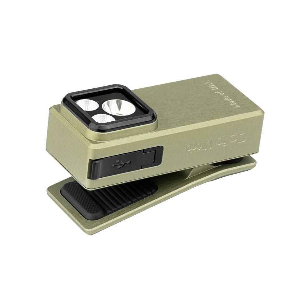 A compact, rectangular metal flashlight in olive green with a clip, featuring three circular LED lights on one end and a USB port on the side.