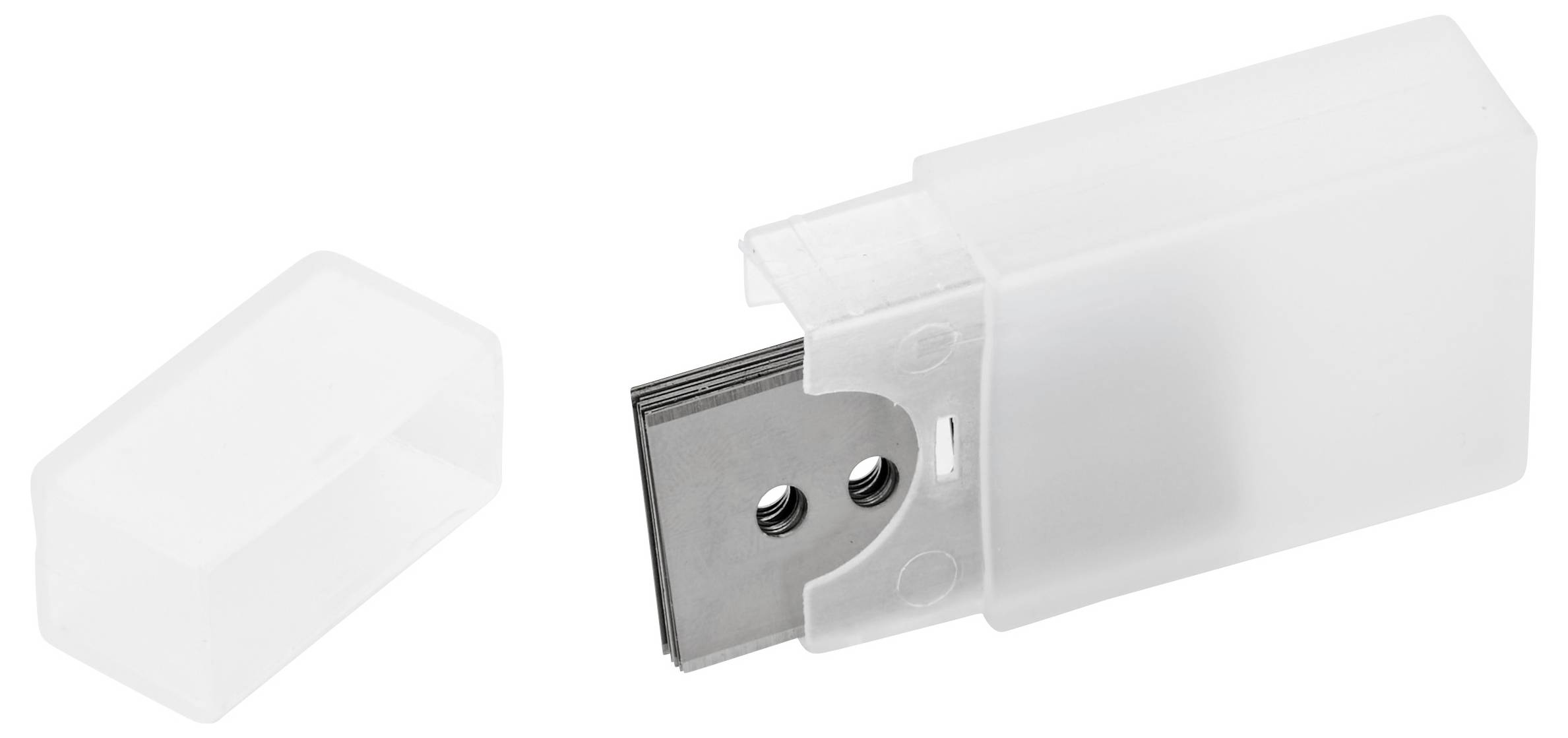 Box cutter blade with transparent plastic cover partially off, showing metal blade with two holes. Cover cap is placed separately beside.