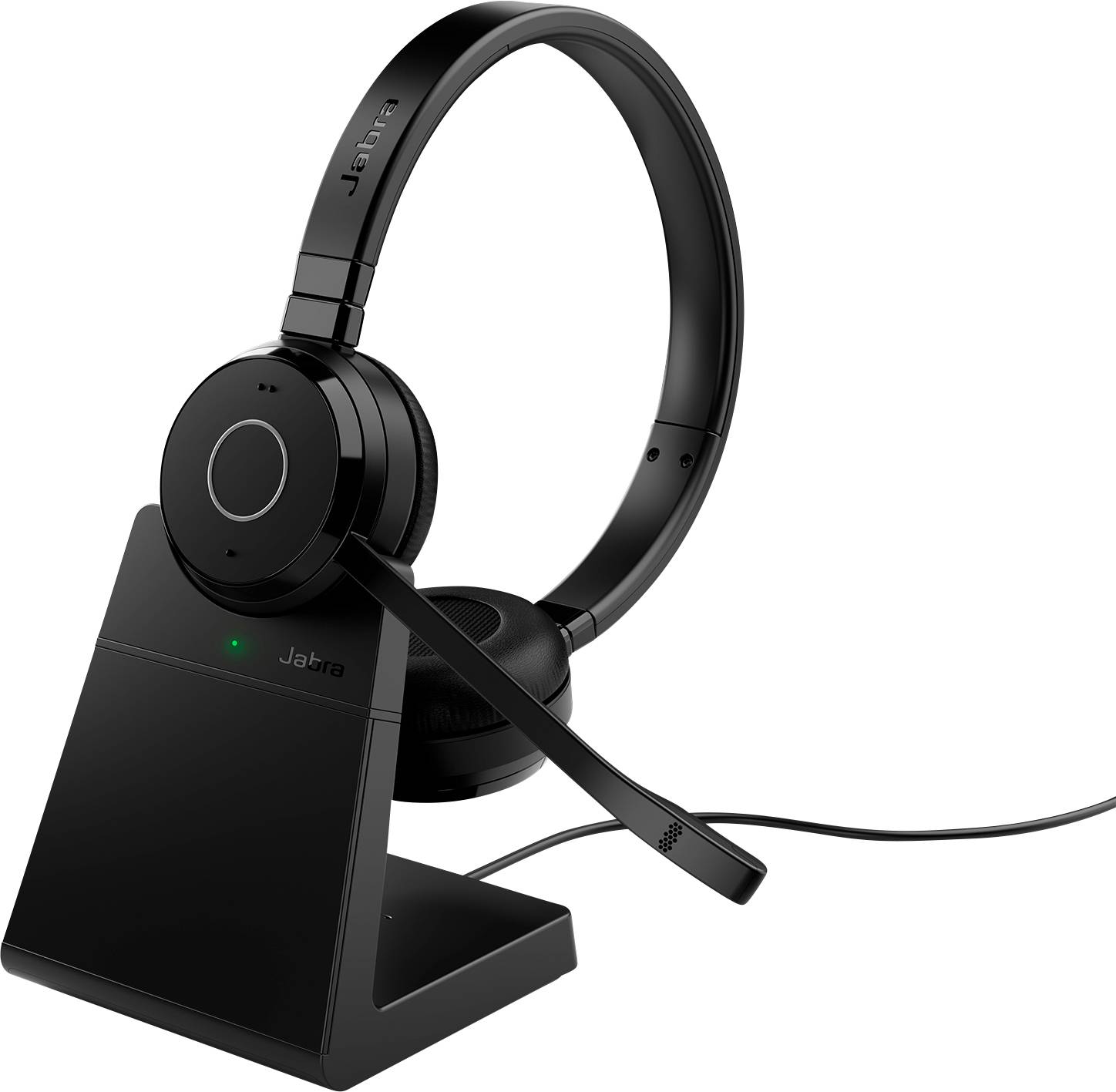 A black Jabra headset resting on a charging stand, with an attached microphone angled forward. A cable extends from the stand.
