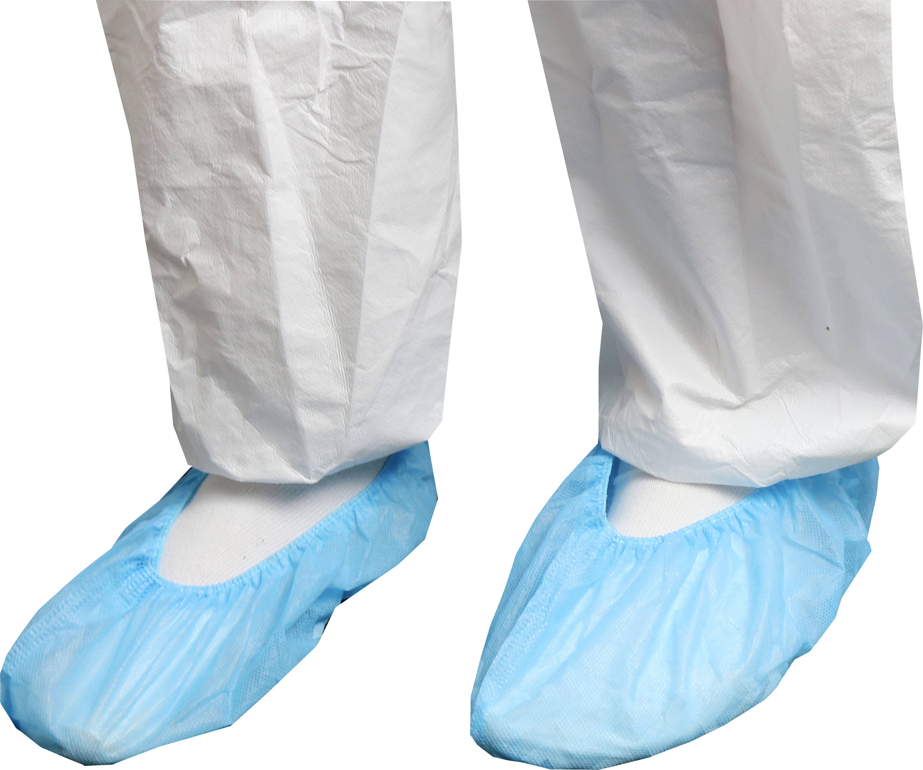 Person wearing white protective pants and blue shoe covers, indicating a clean or sterile environment.