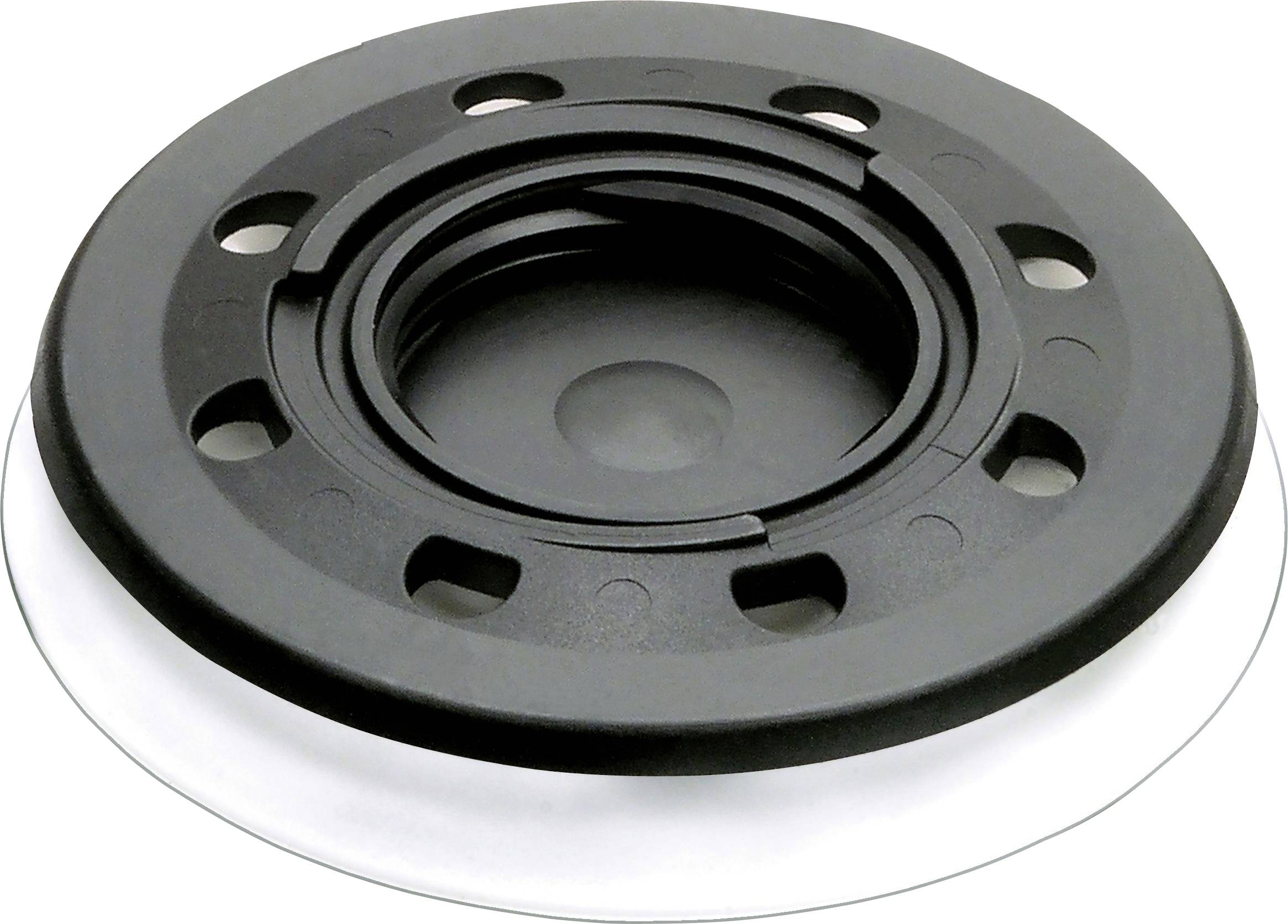 A black circular automotive component with multiple holes and a central groove, possibly a mounting bracket or spacer.