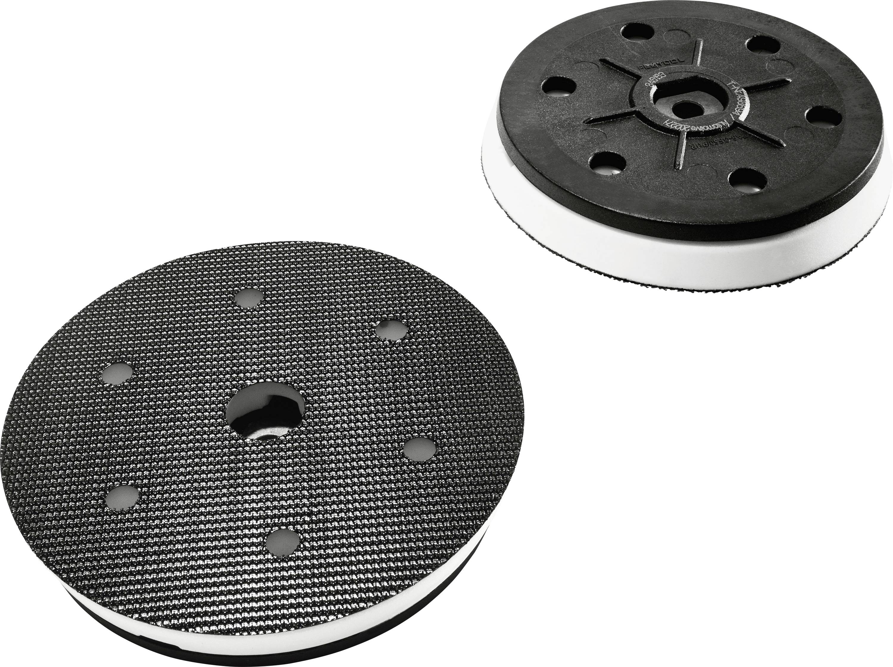 Two circular black machine pads with textured surfaces and white trim. One pad has a central hole and small outer holes.