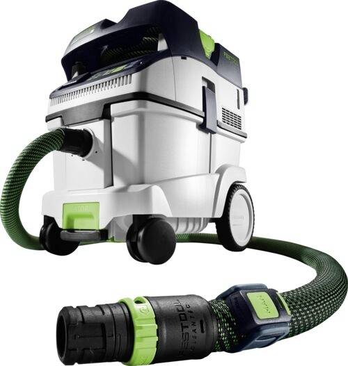 A white and blue industrial vacuum with a green hose, designed for dust extraction. The hose is detachable and has a locking mechanism.