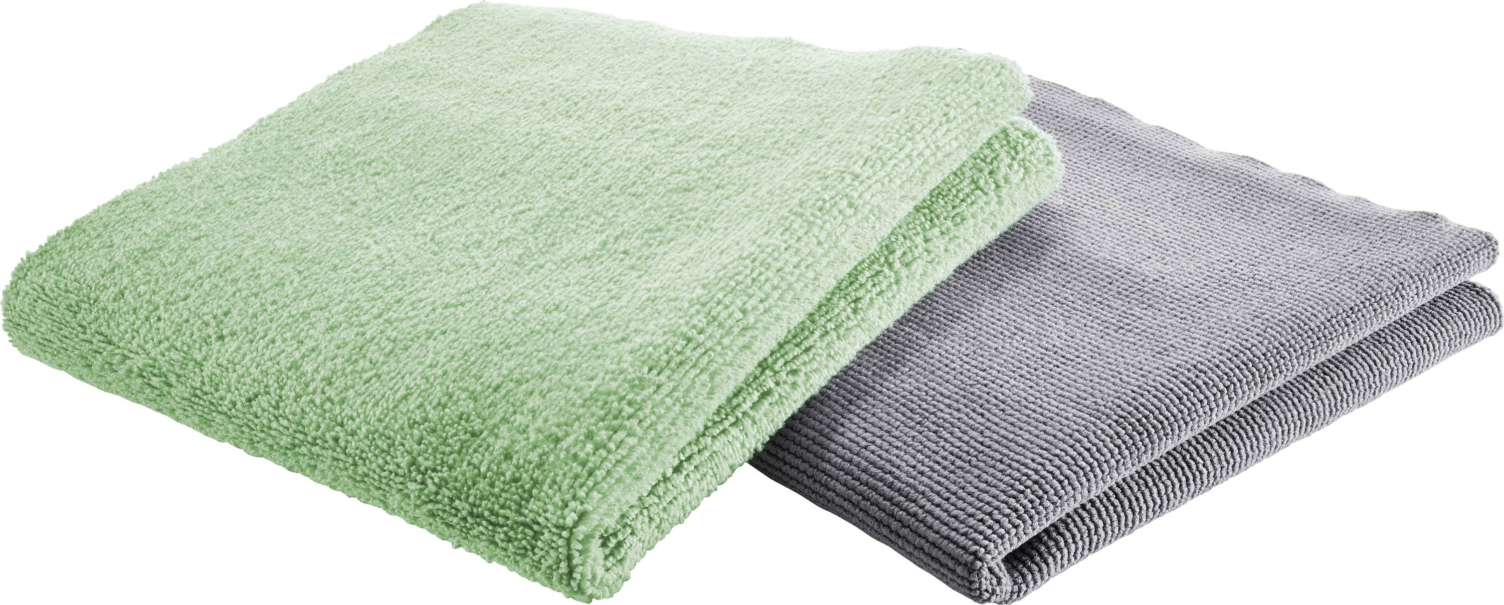 A soft, textured green towel folded next to a smooth, gray towel, showcasing contrasting textures and colors.