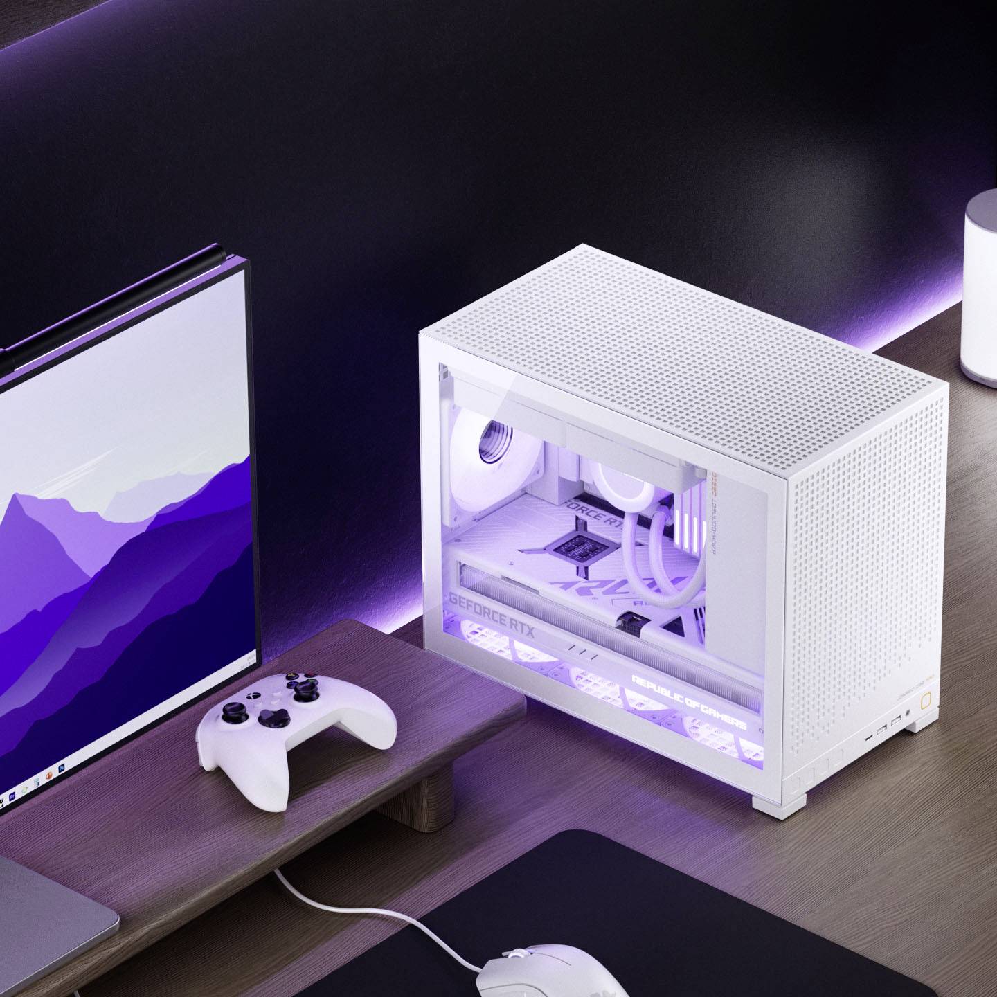 A sleek PC setup featuring a white gaming computer with purple accents, a monitor displaying a mountain wallpaper, a white game controller, and a headphone on a minimalist wooden desk.