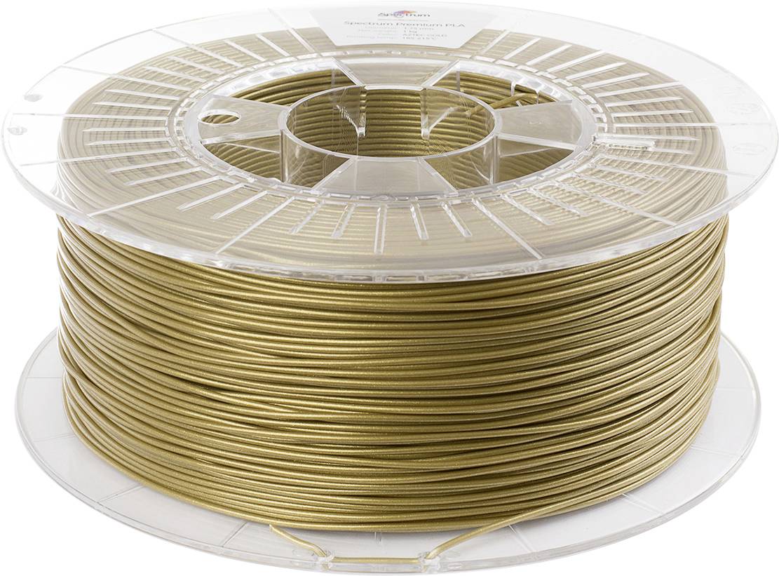 A spool of gold-colored filament, used for 3D printing, is tightly wound onto a clear plastic reel.