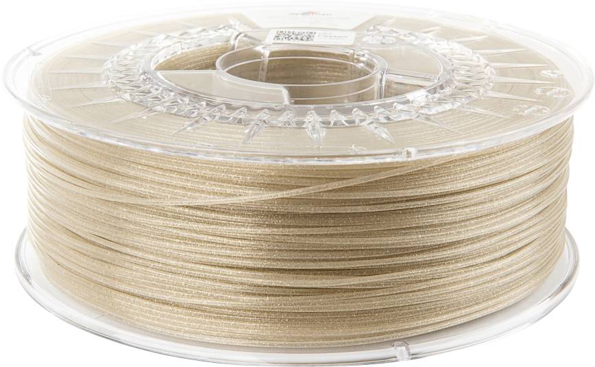 A clear spool containing gold-toned 3D printing filament, coiled neatly. The spool has a modern design with radial spokes.
