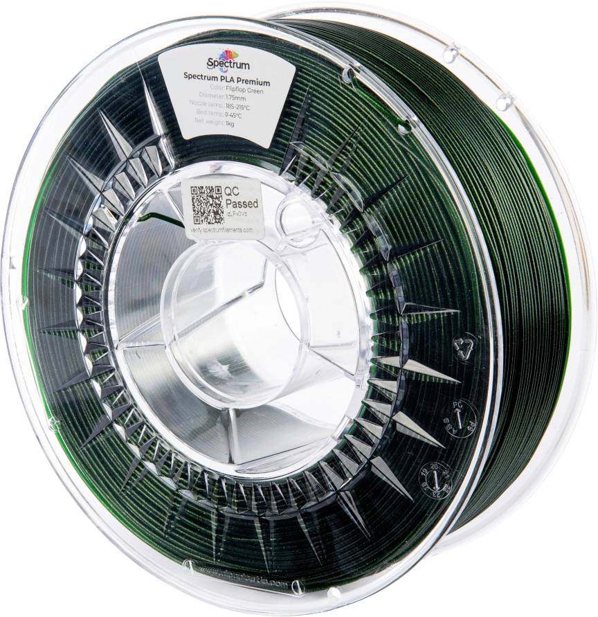 A spool of Spectrum PLA Premium 3D printing filament in dark green. The label shows a QR code and the text 'QC Passed.'
