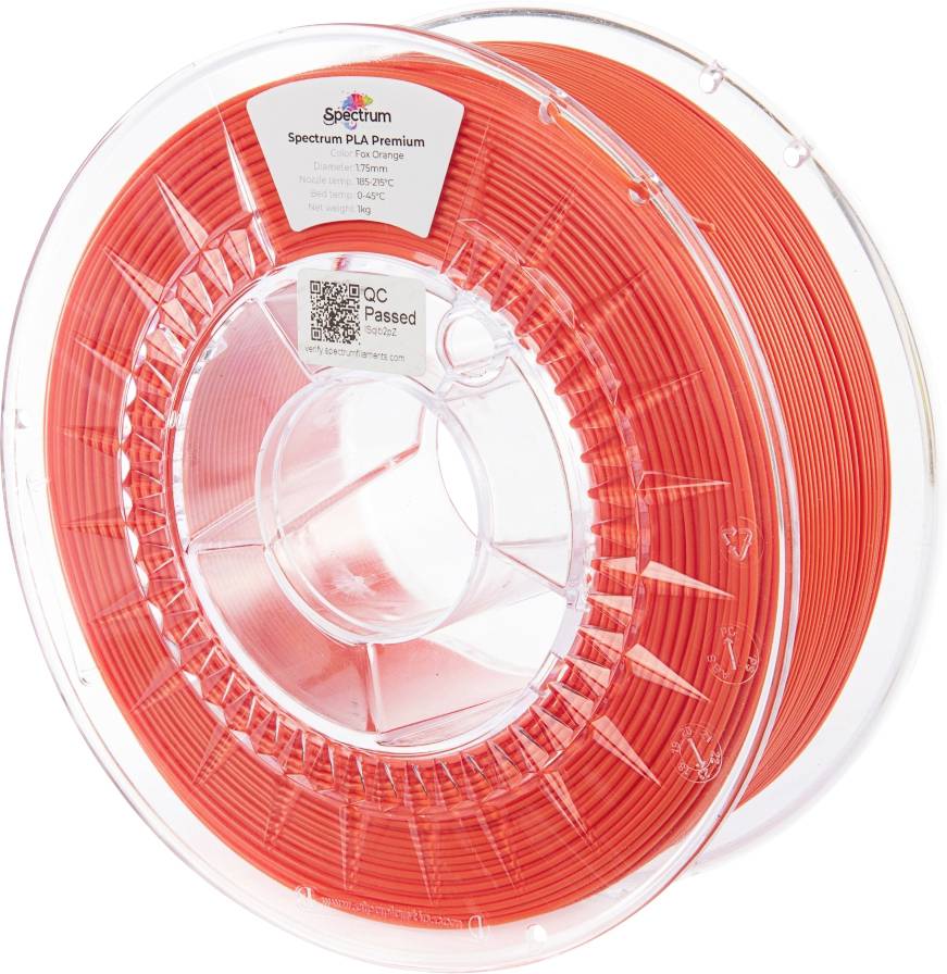 A spool of orange Spectrum PLA Premium 3D printer filament, labeled with product and quality control details.