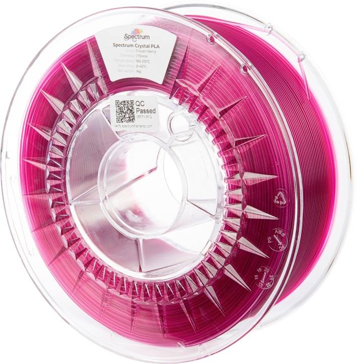 A spool of pink 3D printing filament labeled 'Spectrum Crystal PLA', showcasing its translucent color.