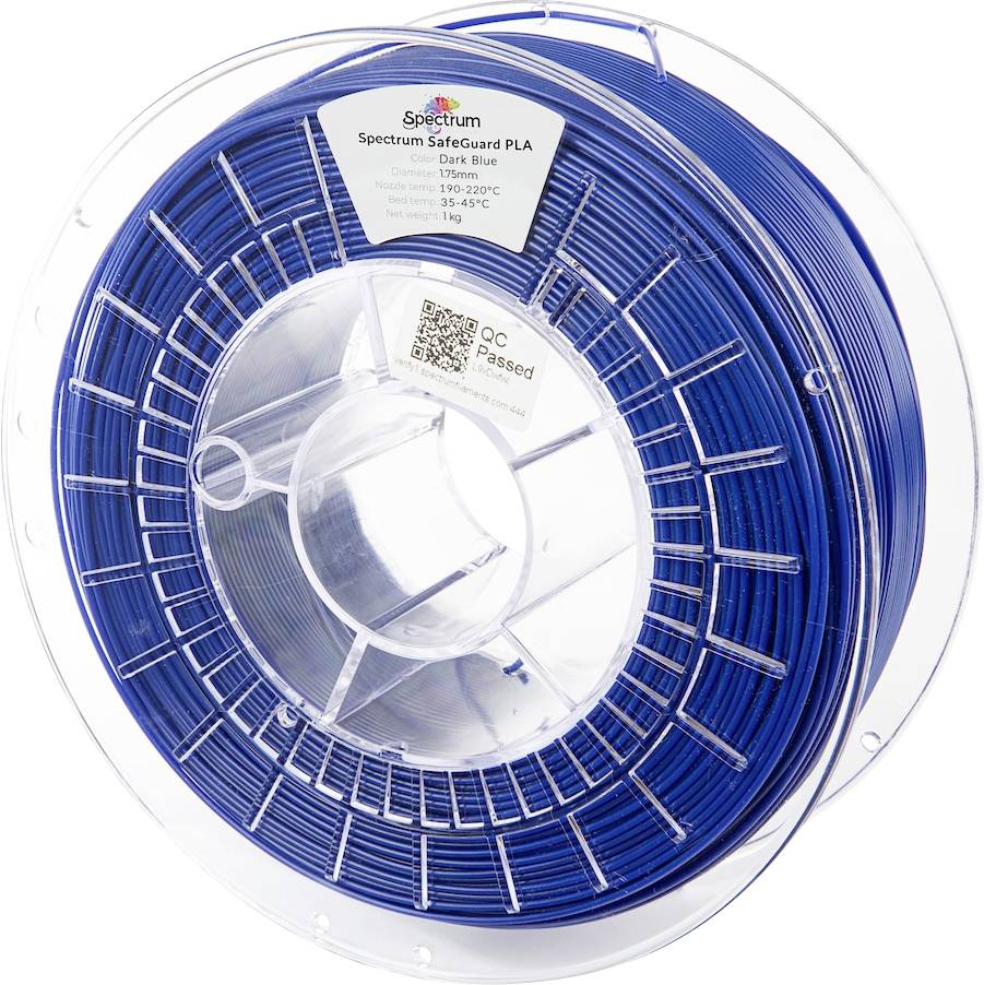 A spool of Spectrum SafeGuard PLA filament in dark blue, labeled with temperature range (190-220°C) and weight (1 kg).