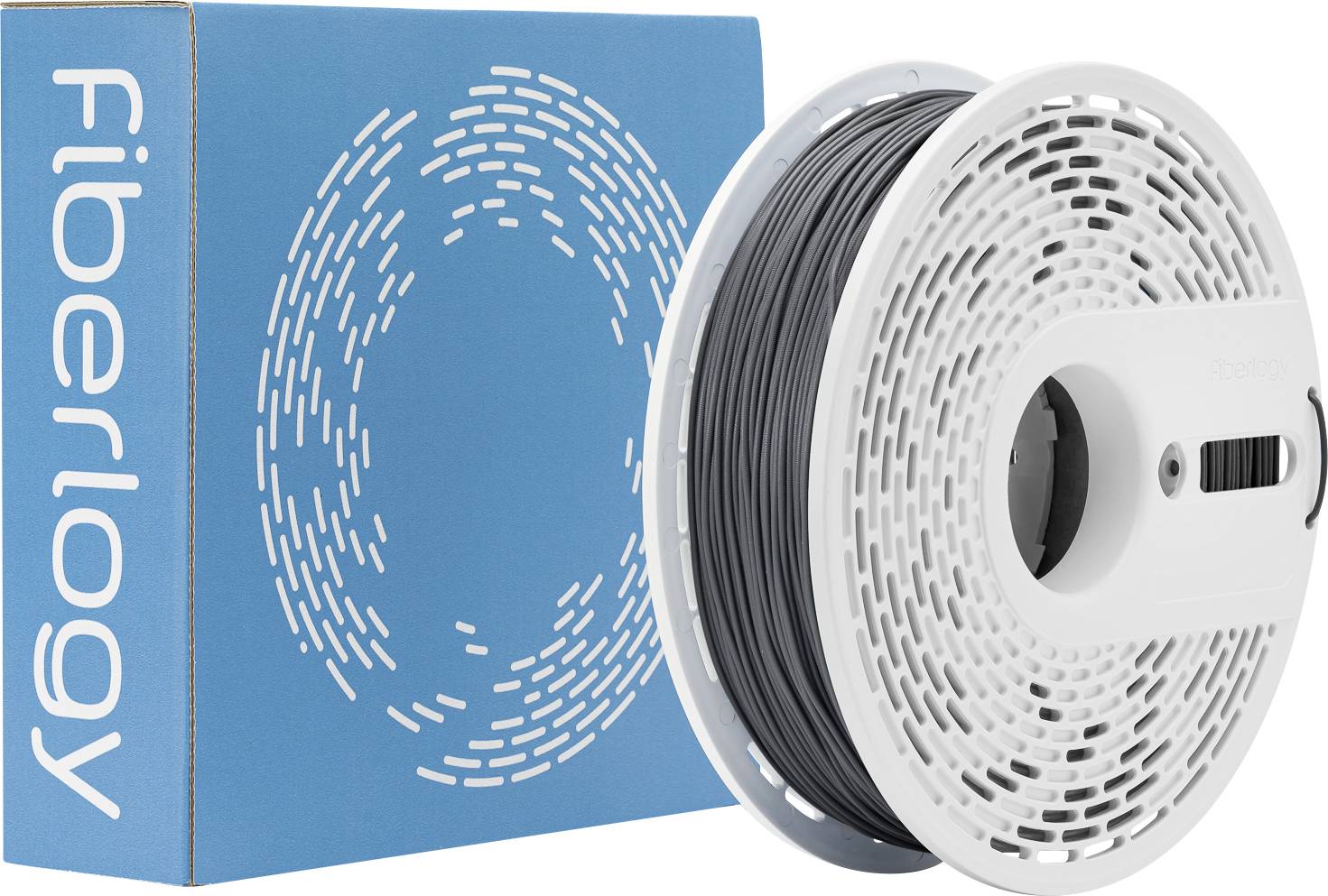 A spool of black 3D printing filament with a blue Fiberlogy box in the background, featuring a circular pattern design.