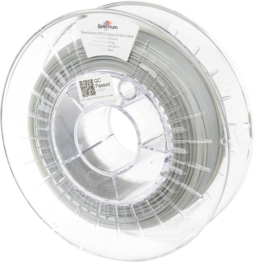 A spool of Spectrum PETG filament labeled 'Glow in the Dark', 1.75 mm diameter, 1 kg, temperature range 230-250°C, with QC passed sticker.