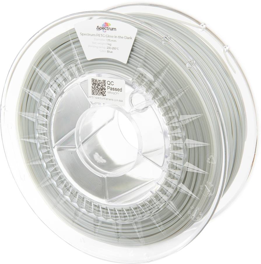 A spool of Spectrum PETG filament labeled 'Glow in the Dark,' 1.75mm size, 1kg weight, recommended printing temperature 230-250°C.